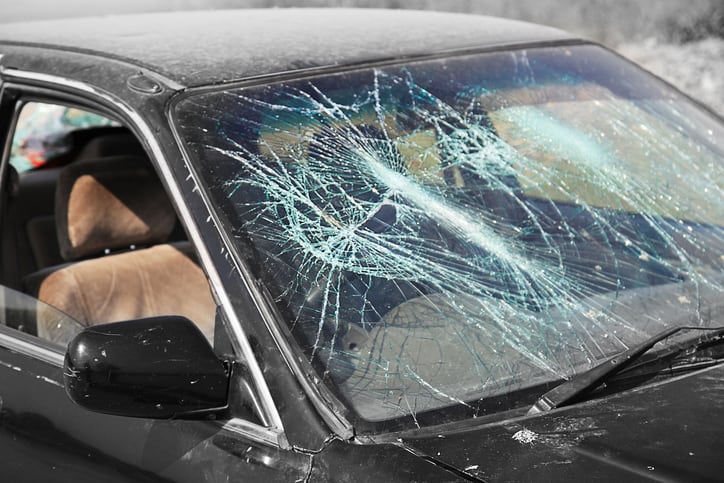 Car accident with shattered front windshield